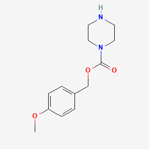 (4-Methoxyphenyl)methyl piperazine-1-carboxylate