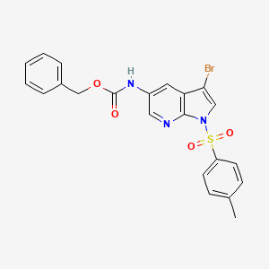 Carbamic acid, N-[3-bromo-1-[(4-methylphenyl)sulfonyl]-1H-pyrrolo[2,3-b]pyridin-5-yl]-, phenylmethyl ester