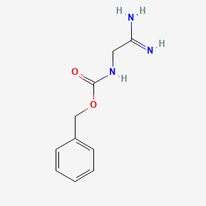 B8807860 Benzyl 2-amino-2-iminoethylcarbamate CAS No. 77390-81-9