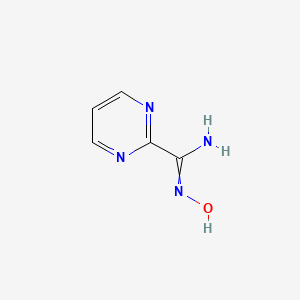 molecular formula C5H6N4O B8808822 N-Hydroxypyrimidine-2-carboximidamide 