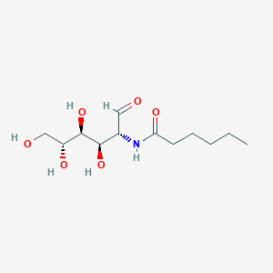 molecular formula C12H23NO6 B008962 N-[(2R,3R,4S,5R)-3,4,5,6-tetrahydroxy-1-oxohexan-2-yl]hexanamide CAS No. 19817-88-0