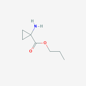 molecular formula C7H13NO2 B009233 Cyclopropanecarboxylic acid, 1-amino-, propyl ester (9CI) CAS No. 104544-05-0