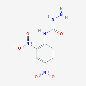 molecular formula C7H7N5O5 B099419 Semicarbazide, 4-(2,4-dinitrophenyl)- CAS No. 18345-18-1