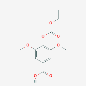 molecular formula C12H14O7 B099487 4-Ethoxycarbonyloxy-3,5-dimethoxybenzoic acid CAS No. 18780-67-1